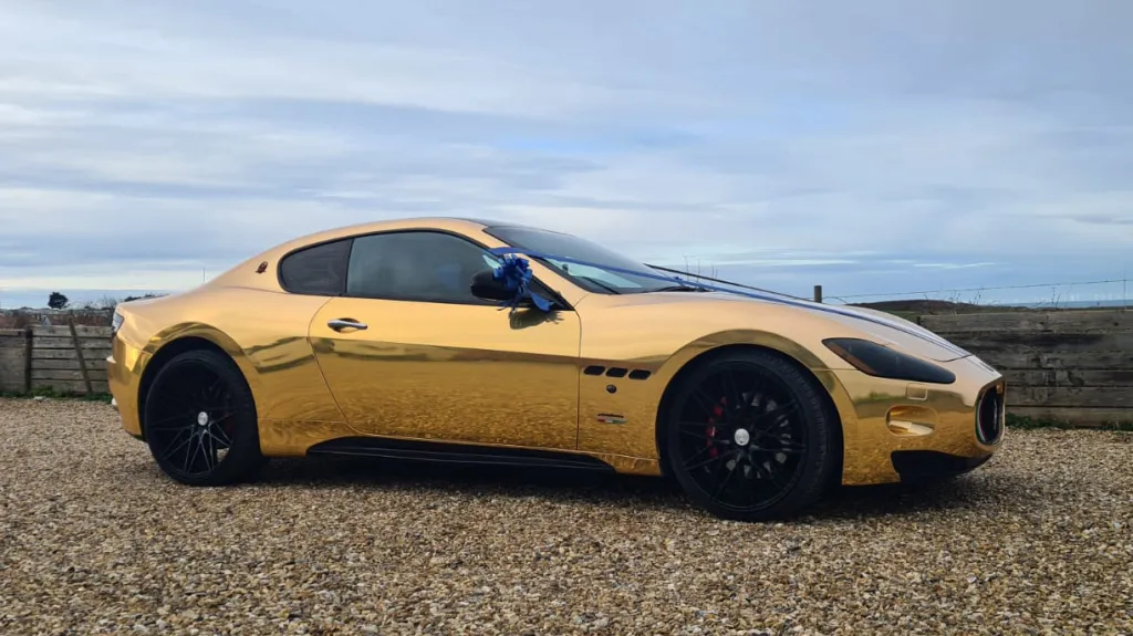Right side view of Gold Maserati