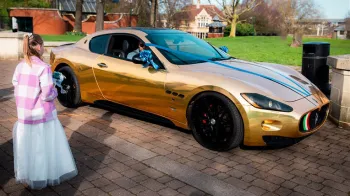 Bridemaid approaching a Gold Maserati