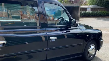 Black London Taxi Cab side view