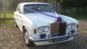 White Classic Rolls-Royce Silver Shadow mk1 dressed with Purple ribbons