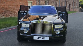 Full front view of Rolls-Royce Phantom showing large chrome front grill