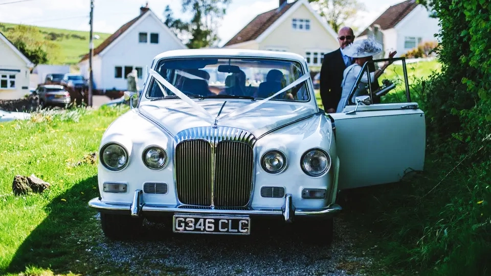 Bride's Mother exiting the Classic Daimler DS420 Limousine