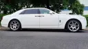 Left side view of White Rolls-Royce Ghost