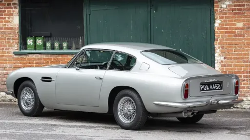 Rear left side view of Aston Martin DB6