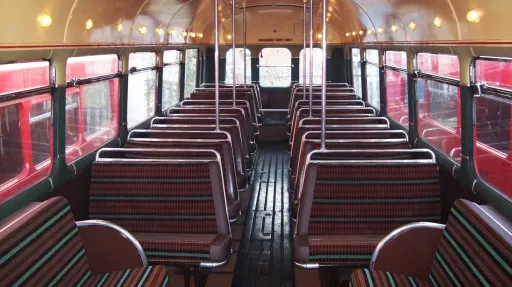 interior seating inside single decker red bus