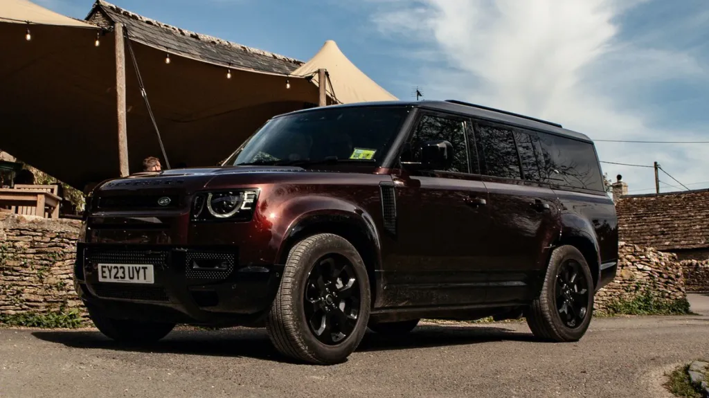 Modern Land Rover Defender 130 in Sedona Red