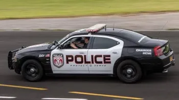Left side view of american police car Dodge Charger