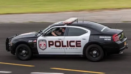 Left side view of american police car Dodge Charger