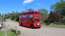 Red Double Decker Bus parked at a wedding venue in Northumberland