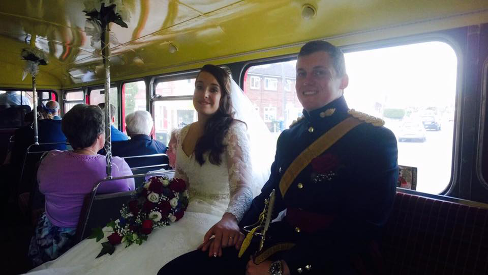 Bride and Groom inside Routemaster Wedding Bus.