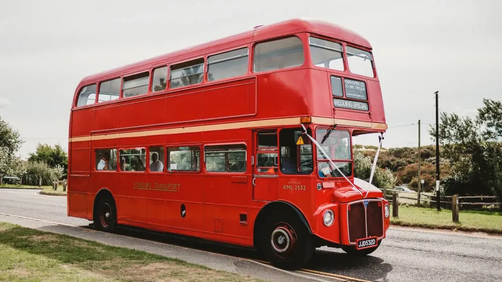 Old Vintage double decker London Routemaster bus decorated with white ribbons