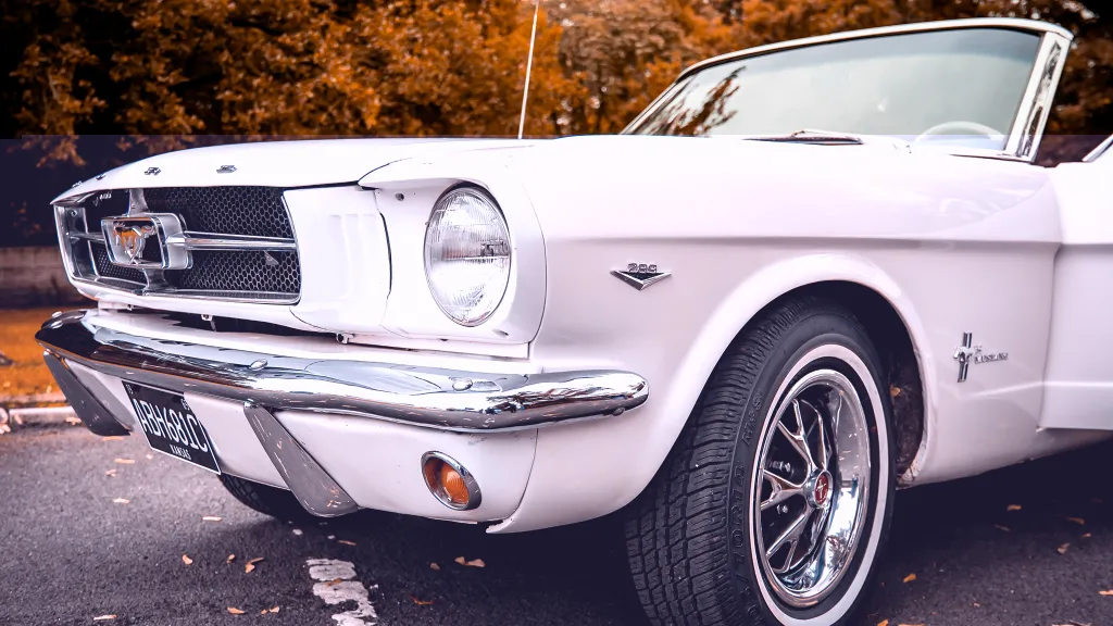 Front side view of Ford Mustang in white