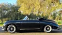 Left side view of a Black Convertible Porsche