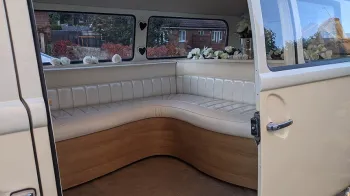 white leather interior inside a classic volkswagen Campervan
