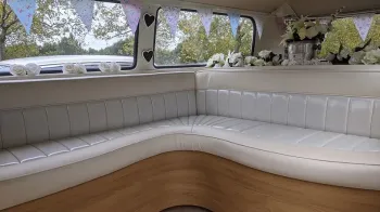 white leather interior inside a classic vw Campervan