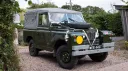 Classic Landrover Series 2 in Army Green with Light grey Canvas decorated with white wedding ribbons