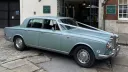 Rolls-Royce Silver Shadow dressed with white ribbons parked in the street of Bristol