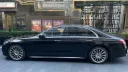 Left side view of Black Mercedes parked in street of London