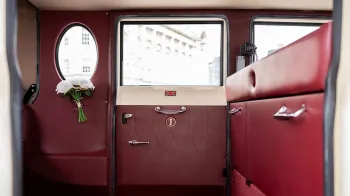 Main Rear interior cabing in Burgundy with two occasional seats up.