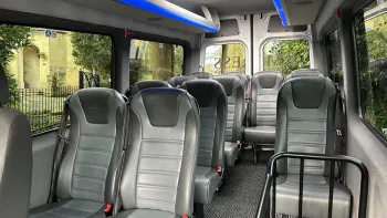 Mercedes 12 Seater Bus interior of silver and grey seats