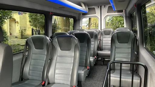 Mercedes 12 Seater Bus interior of silver and grey seats