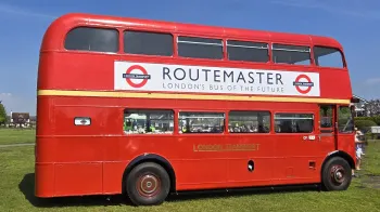 Right side view of Red Double Decker Bus parked on Christchurch Quay