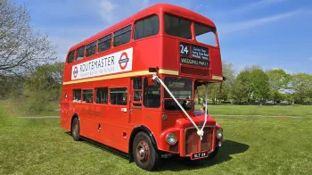 Routemaster London Bus decorated with white ribbons and bows