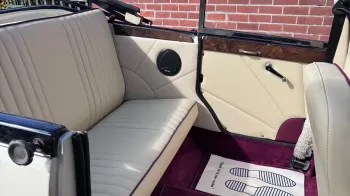 Rear cream leather interior with Burgundy Carpet