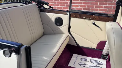 Rear cream leather interior with Burgundy Carpet