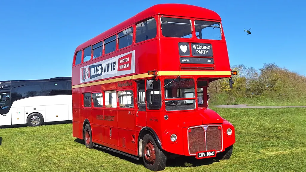 Right side view of Classic Double Decker Routemaster Bus with original advertising on side