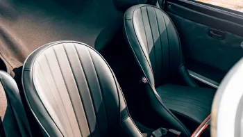 interior black leather seat with space for one passenger and one chauffeur