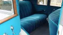 Rear interior blue velour seats inside a Vintage American Buick