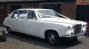 Front right view of Classic Daimler Limousine in Old English white with white ribbons