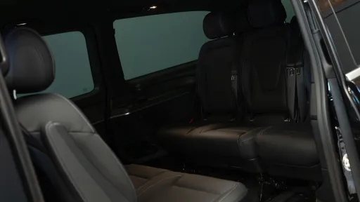 Black Leather rear interior inside setas facing each others in Mercedes People Carrier