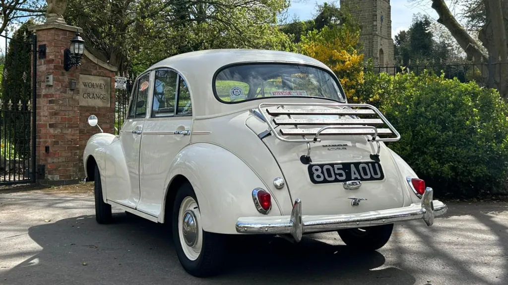 Rear view of an Old English White Morris Minor.