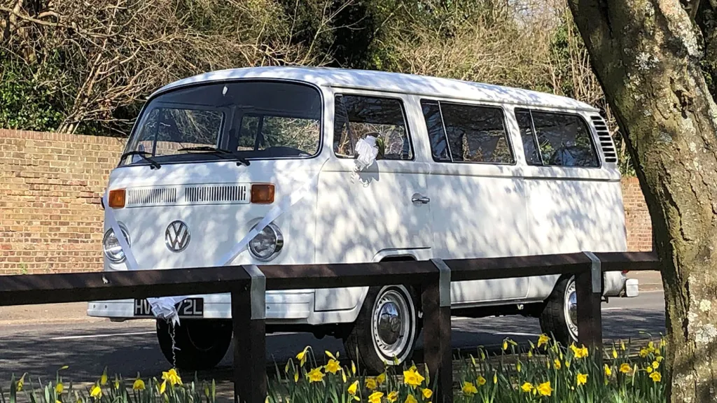 Left side view of a white classic VW Campervan