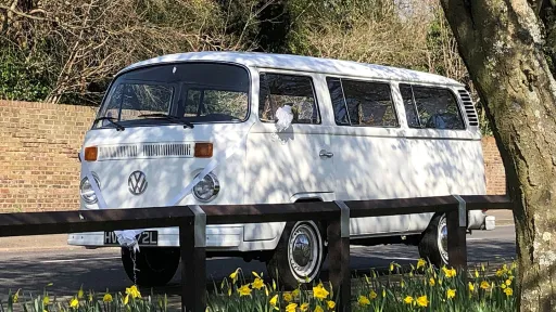 Left side view of a white classic VW Campervan
