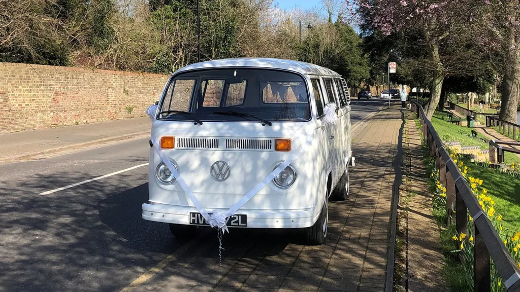 Front view of a classic campervan with Baywindow in white