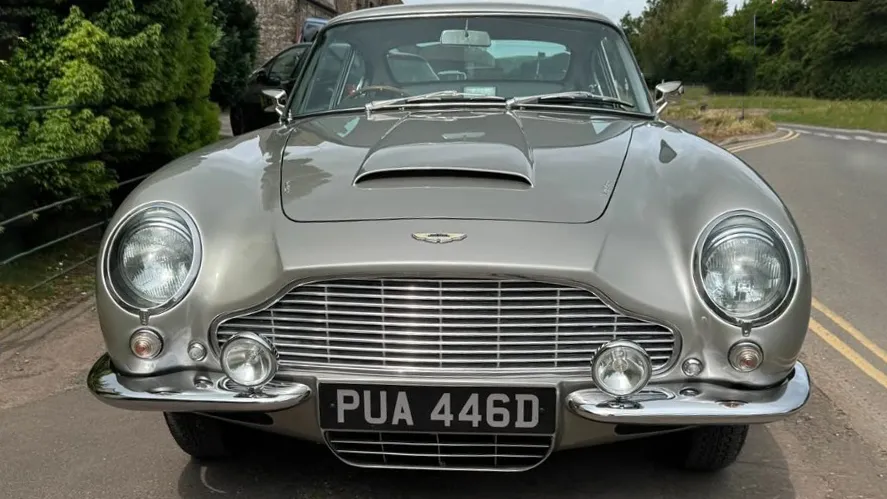 Full front view showing the iconic Classic Aston Martin chrome front grill