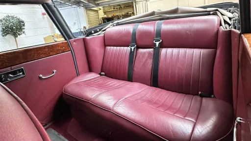 Rear interior seating in Burgundy leather and two rear seat belts