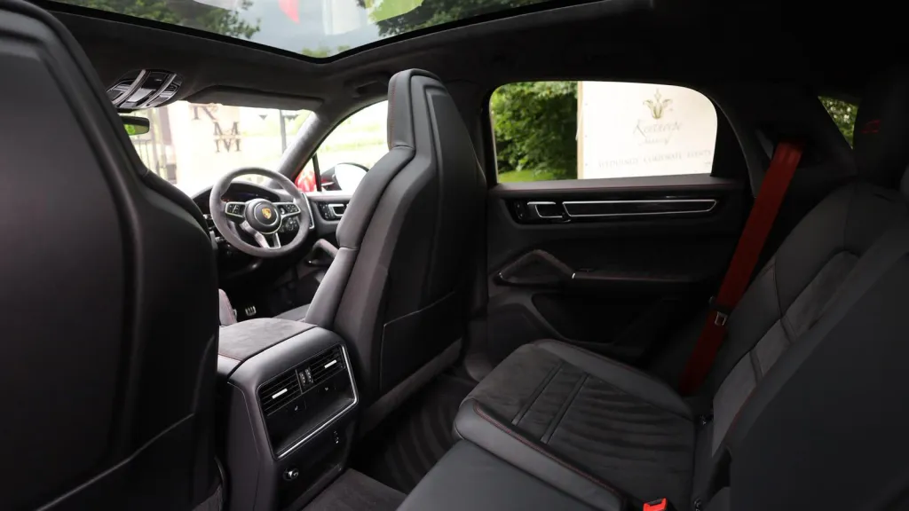 Black Porsche Cayenne GTS rear interior seating with black leather interior