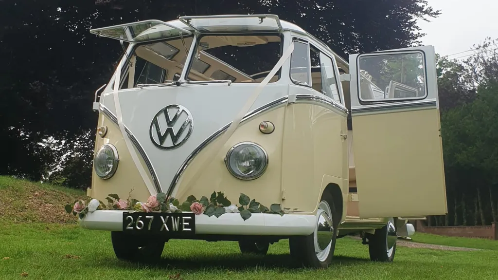 Classic Volkswagen Campervan in White & Cream with front splitscreen windows open