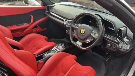 Red leather interior seats from the driver's side