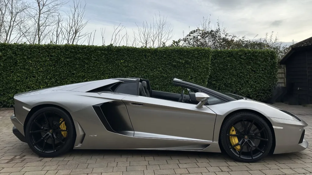 Lamborghini Aventador right side view with roof open
