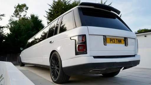 rear view white streted limousine
