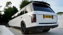 rear view white streted limousine