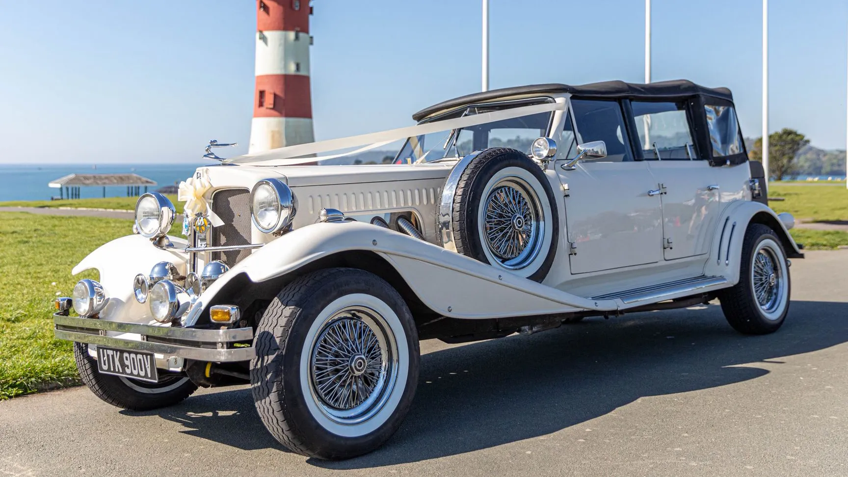 vintage Beauford with black soft top closed