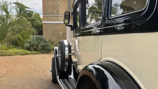 Side view Ivory Badsworth with spare wheel mounted on the left side
