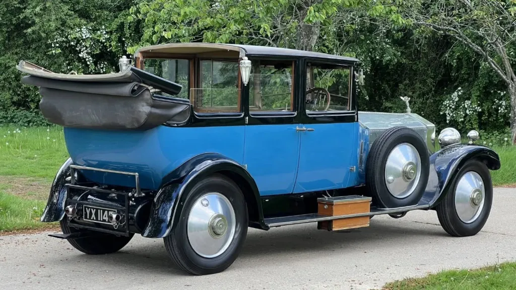Right side rear view of convertible vintage Rolls-Royce Phantom 1 in blue