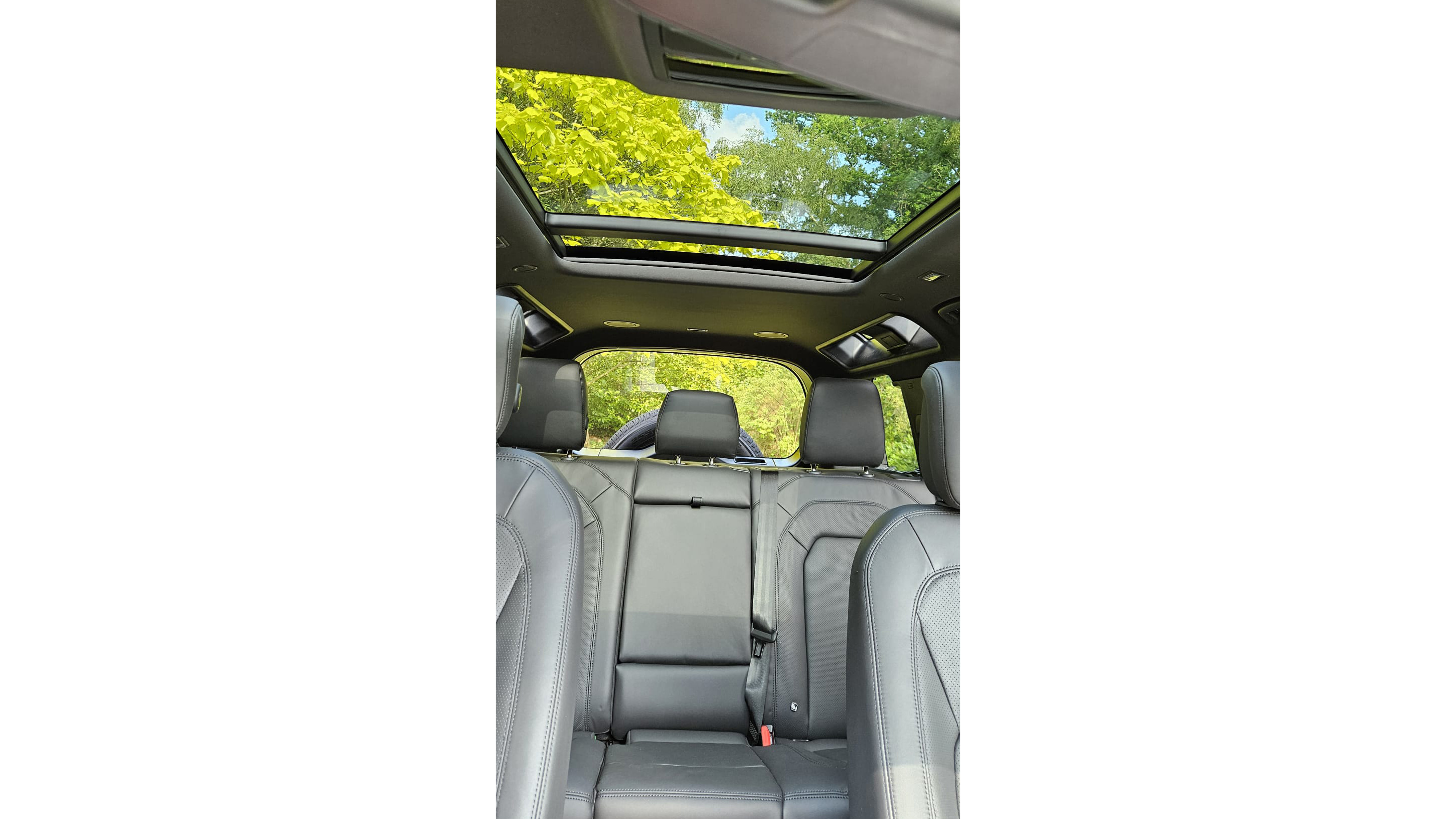 Landscape photo of the rear taken fromt hte front seats showing the Panoramic sunroof